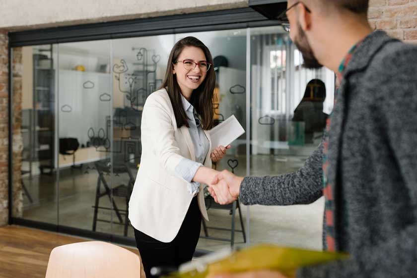 Manager closing the deal on a successful outsourcing partnership