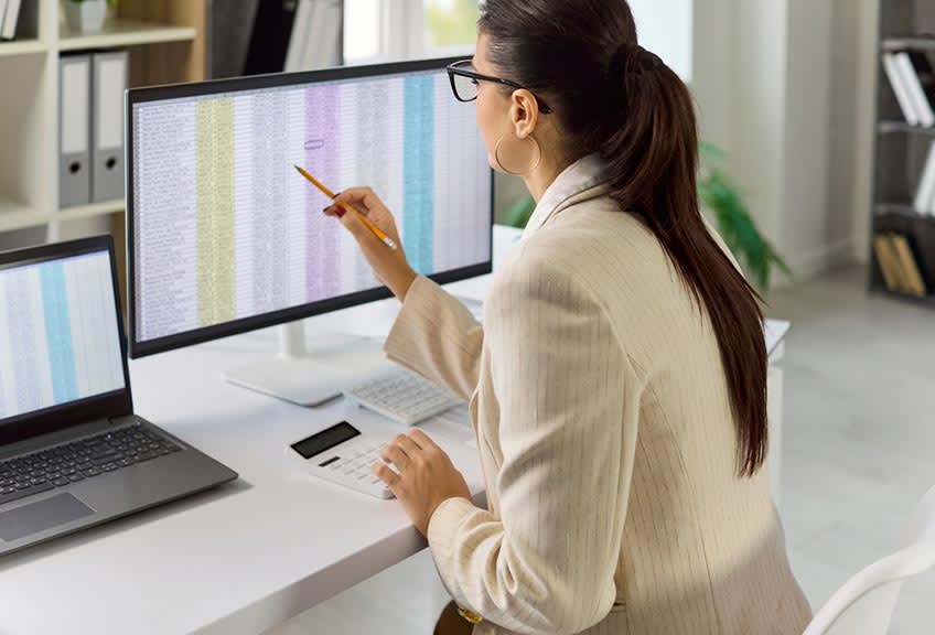 Finance director working on basic bookkeeping and menial accounting tasks