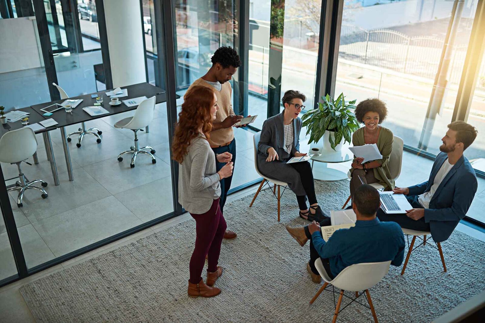 executive team discussing the best ways to start strengthening a business