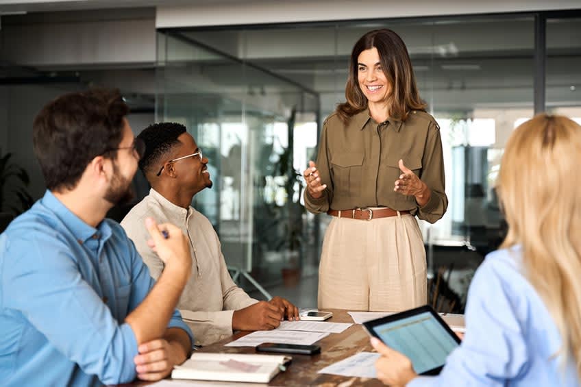 HR boss discussing new datapoints to add to guide for workplace culture with colleagues