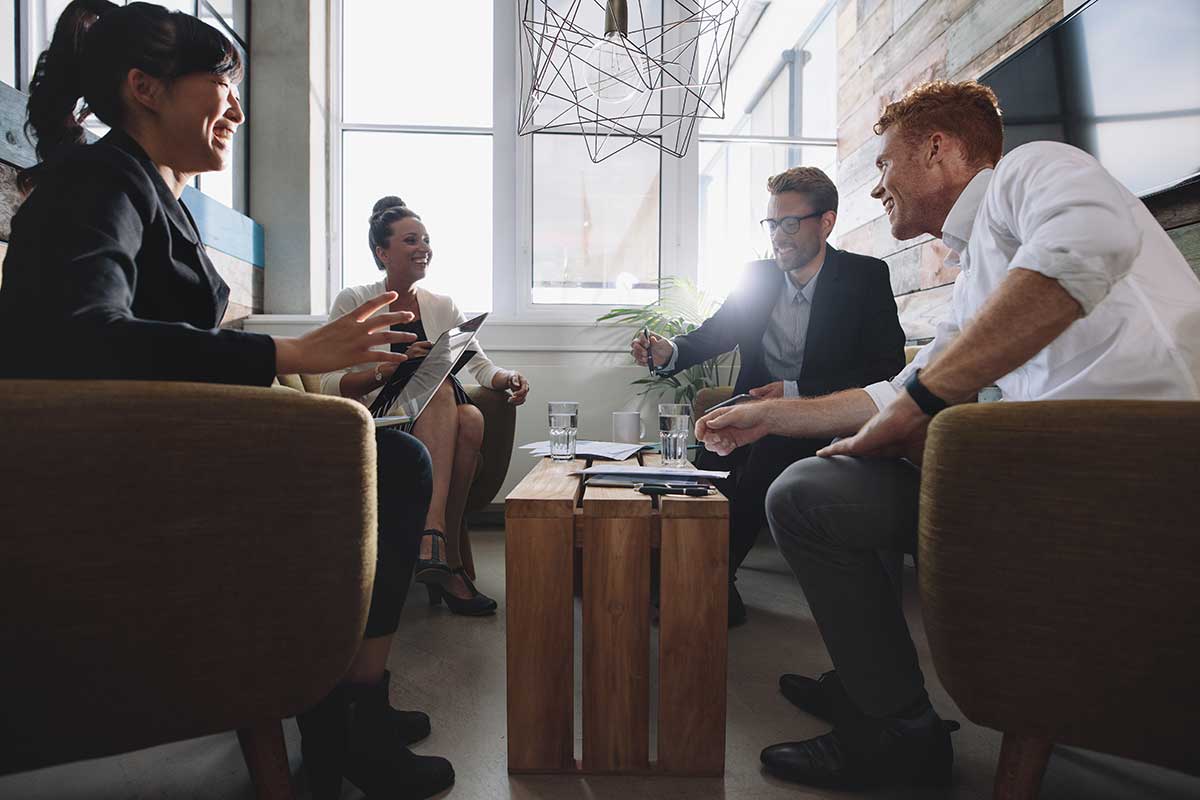 people interacting in room in the technology automation age