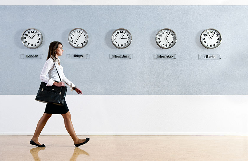 time zone clocks hung on wall of outsourcing company in New Delhi