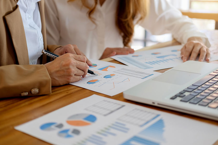 Outsourcing partner checking financial reports
