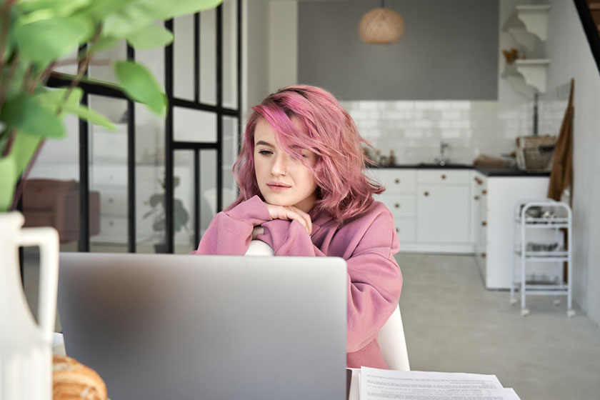 gen z accountant using computer and other technology