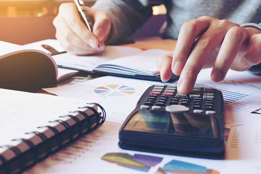 accountant calculating human capital and employee costs
