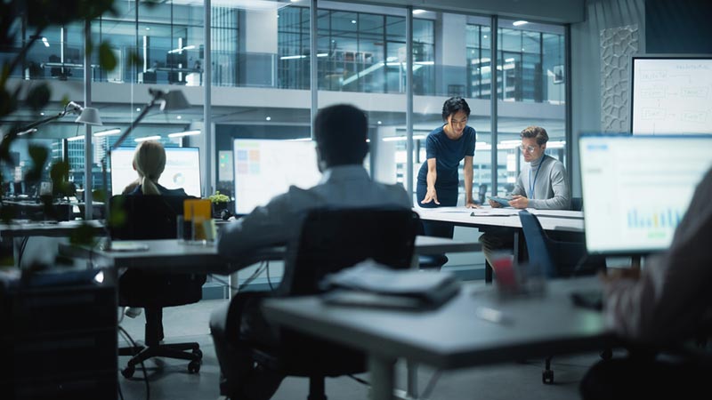 in-house finance talent working in a futuristic office space