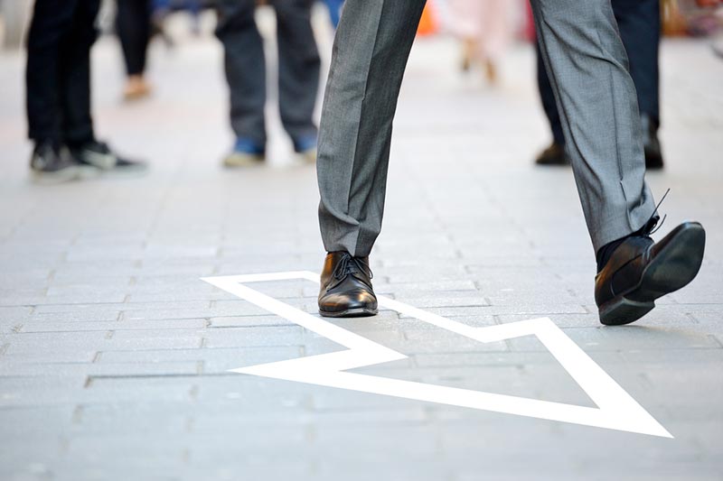 finance professional walking to accounting meeting