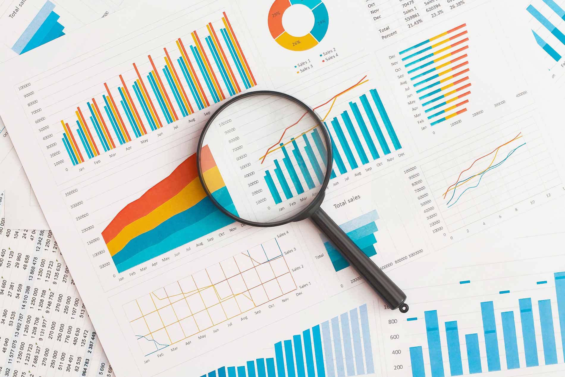 magnifier on business charts showing how much accounting has changed