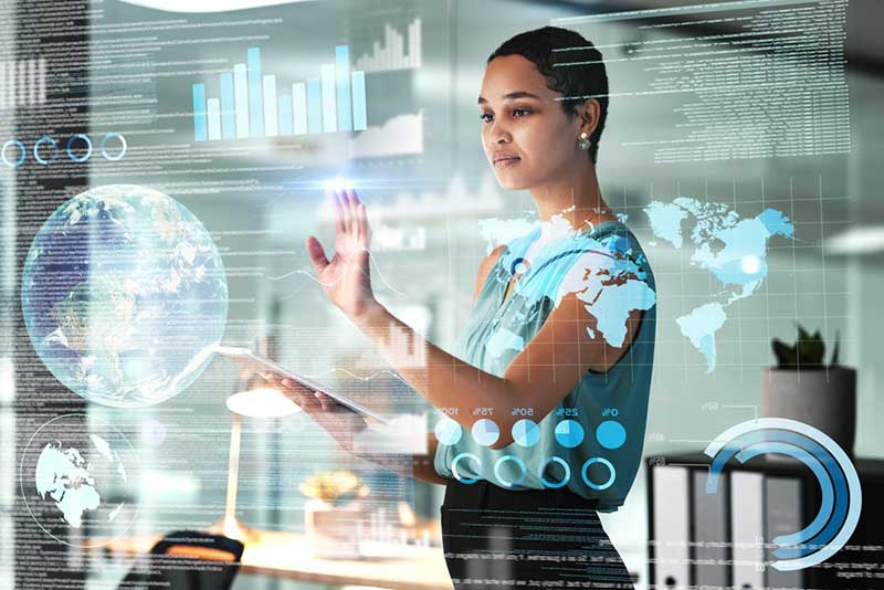businesswoman using an ai or ux interface overlay. Working on a 3d hologram