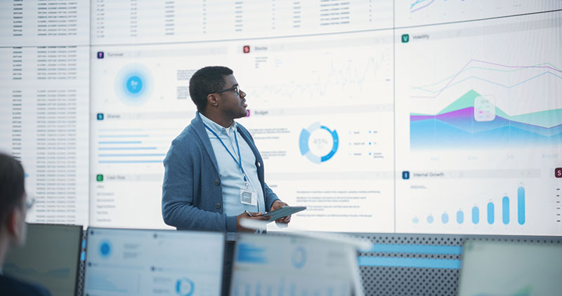 data analyst checking new trends and demand for data-driven decision making software
