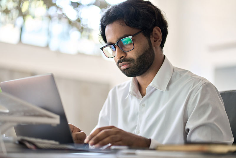 business owner in India calculating why business isn't cost-effective