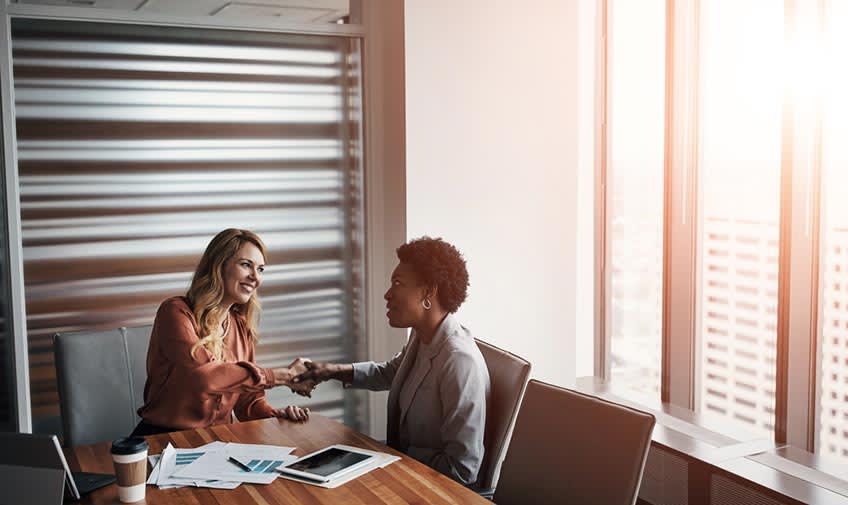 CFO and CMO calculating accounting outsourcing costs