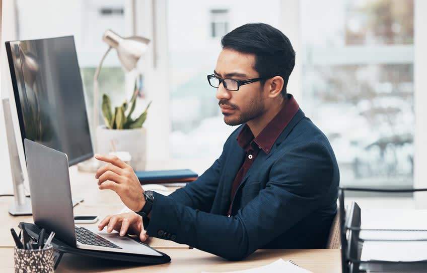 Finance professional learning new materials in preparation for the vacant CFO seat